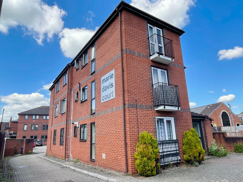 Side of building showing sign